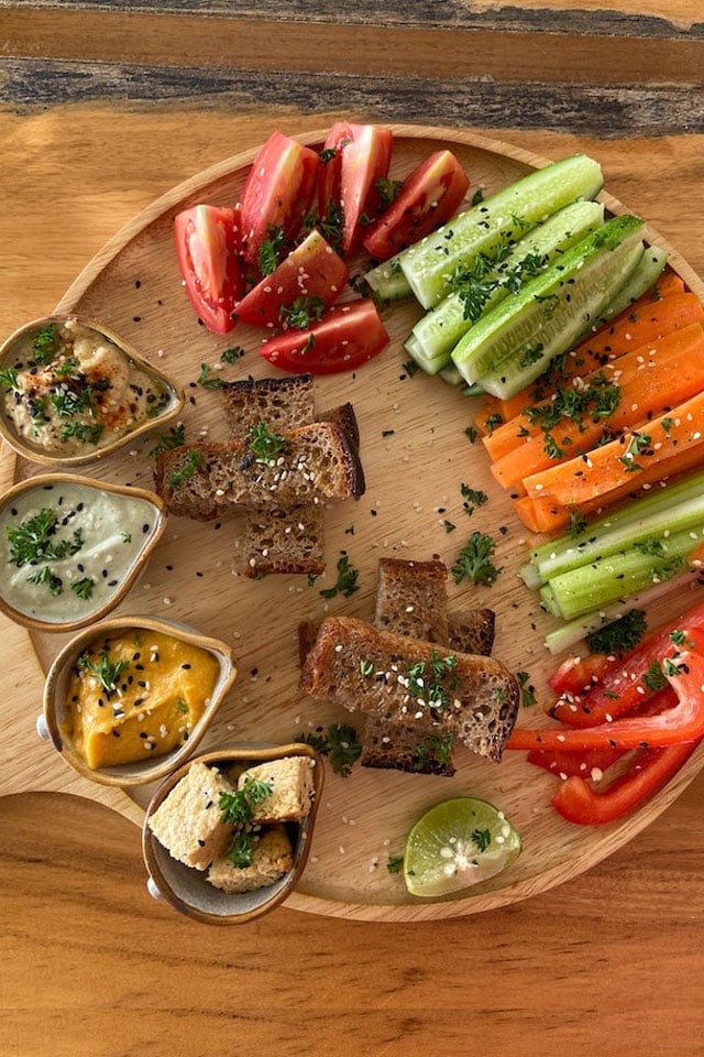 A Beautiful crudite platter, tartines, cucumber, carrot filled.- vegetarian idea